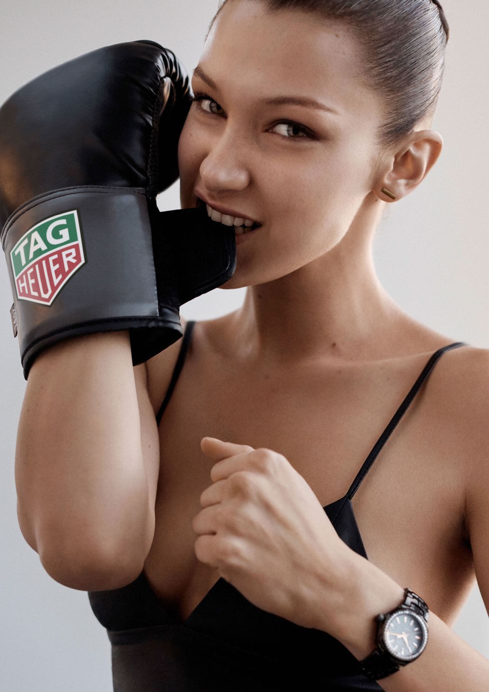 Boxing glove, Boxing, Boxing equipment, Arm, Kickboxing, Striking combat sports, Punch, Combat sport, Contact sport, Glove, 