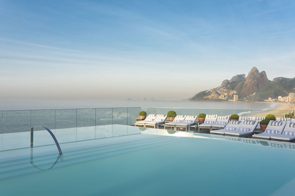 <p><span>There's no better view along Rio's iconic Ipanema Beach and out across the Atlantic waves than from the rooftop of Hotel Fasano. Here, guests – who have included Lady Gaga and Madonna – can swim in&nbsp;</span><span>a luxurious infinity pool crafted by the designer Philippe Starck. His influence can also be seen in the&nbsp;</span><span>89 rooms, decked out with contemporary furniture and&nbsp;</span><span>tree trunks for bedside tables. Staying true to the city's&nbsp;</span><span>laid-back vibe, all guests are given a pair of flip-flops on arrival to get them into the holiday mood.</span></p><p>
<i data-redactor-tag="i">From about £655 a room a night (<a href="http://www.fasano.com.br" target="_blank" data-tracking-id="recirc-text-link">fasano.com.br</a>).<br></i></p>