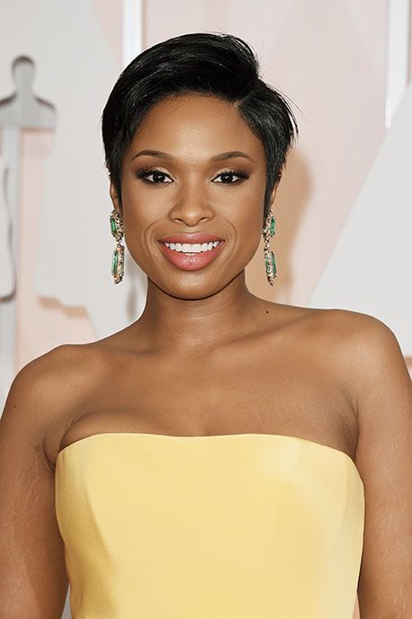Clothing, Hair, Face, Ear, Lip, Strapless dress, Earrings, Hairstyle, Yellow, Skin, 