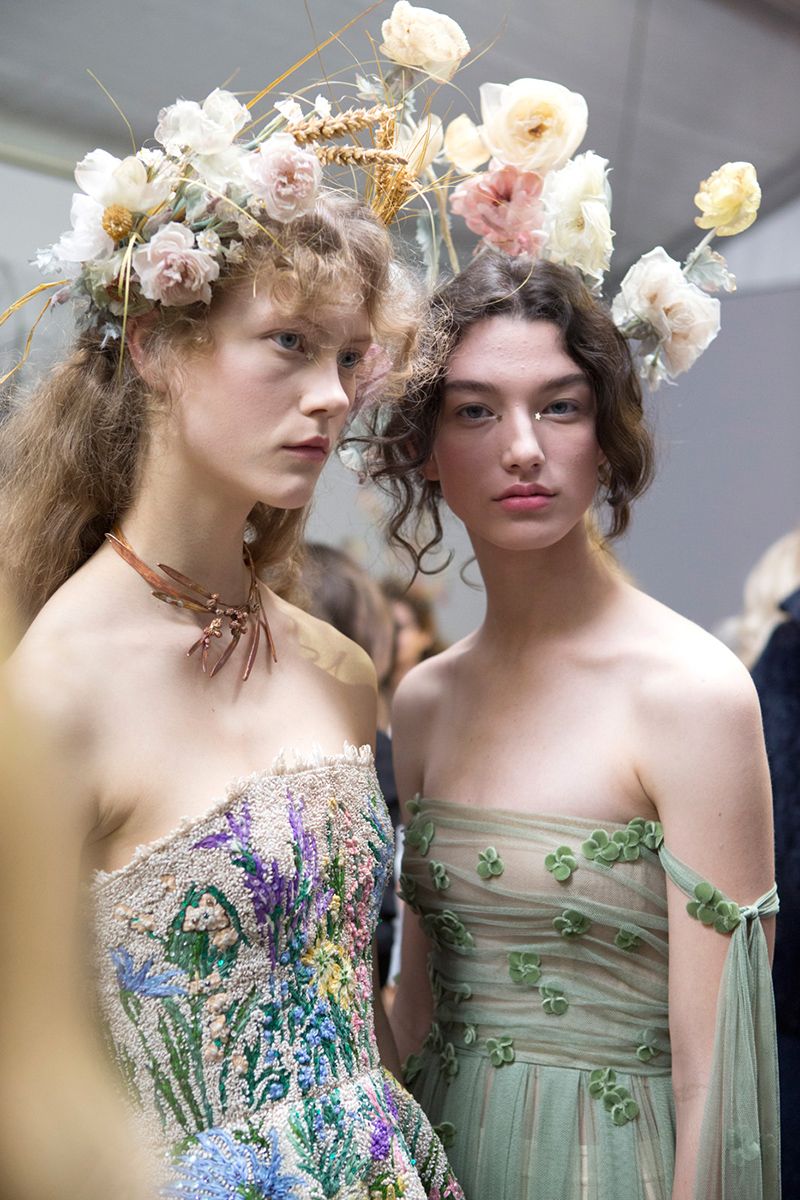 <p>At Dior's Haute couture show, models walked the runway looking like Disney princesses come to life—with the ethereal gowns and floral crows to match.</p>