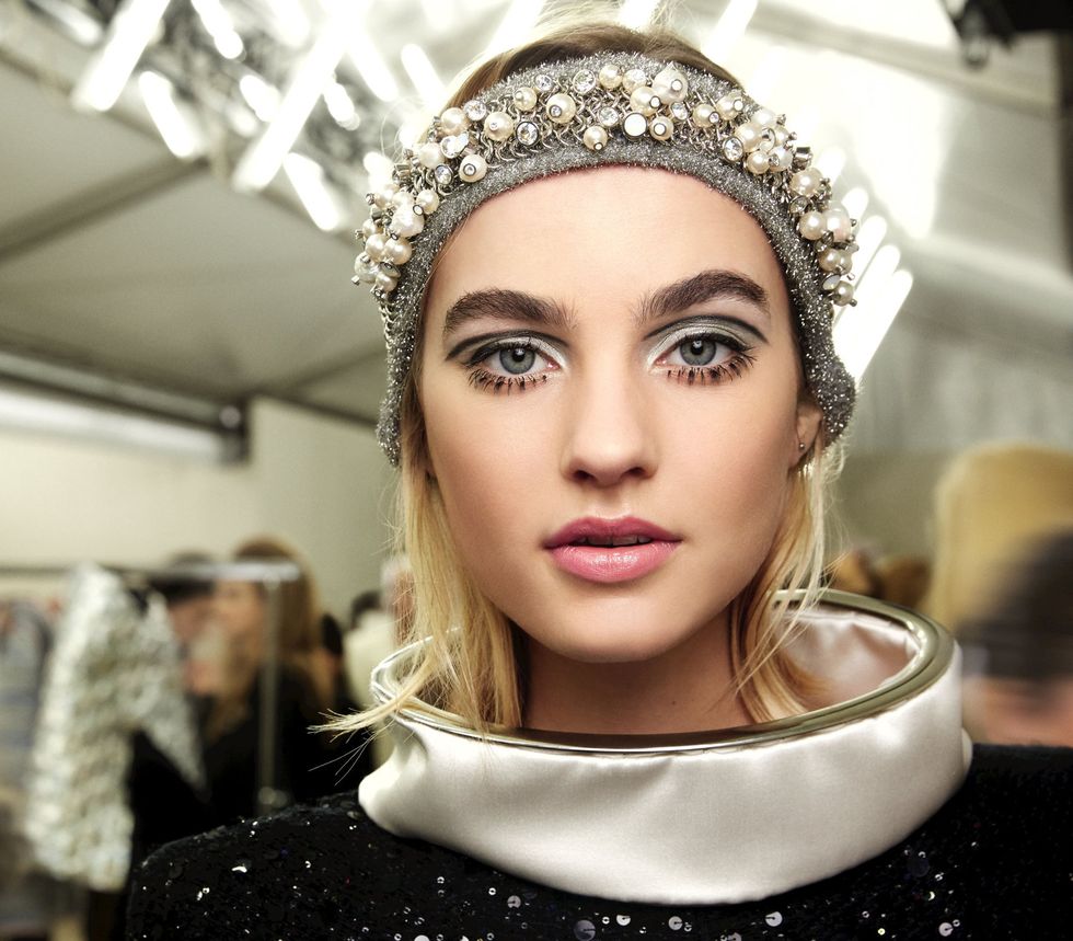 <p>The classic Chanel pearls motif got a cool-girl update at the fall show, resulting in embellished headbands.</p>