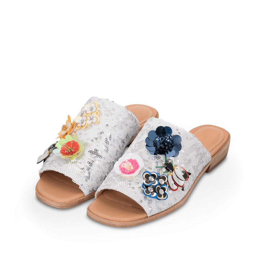 <p>Bill Blass, $248; <a href="https://www.anthropologie.com/shop/bill-blass-sequin-floral-slides?adpos=1o6&amp;adtype=pla&amp;cm_mmc=Google-_-US%20-%20Shopping%20-%20Shoes-_-Sandals-_-41401696&amp;color=010&amp;creative=114547717764&amp;device=c&amp;gclid=CJGyso7E7dICFQtXDQodfIkBmw&amp;matchtype=&amp;network=g&amp;product_id=41401696&amp;size=9." target="_blank" data-tracking-id="recirc-text-link">anthropologie.com</a></p>