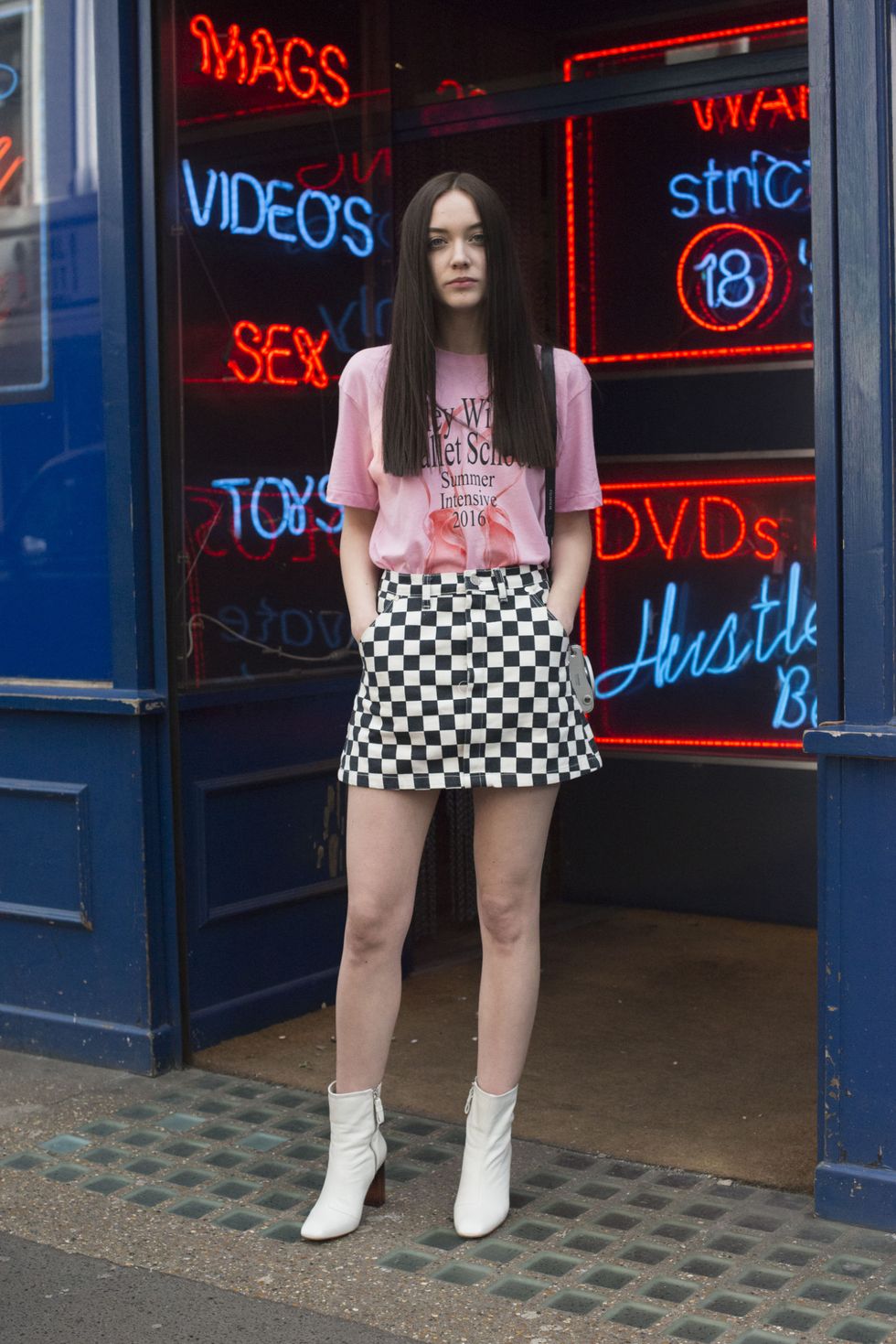 LONDON, ENGLAND - FEBRUARY 23: Influencer and model Elizabeth Jane Bishop wears a Unif skirt, Ashley Williams t-shirt, and Kurt Geiger shoes on day 5 during London Fashion Week Autumn/Winter 2016/17 on February 23, 2016 in London, England.  (Photo by Kirstin Sinclair/Getty Images)