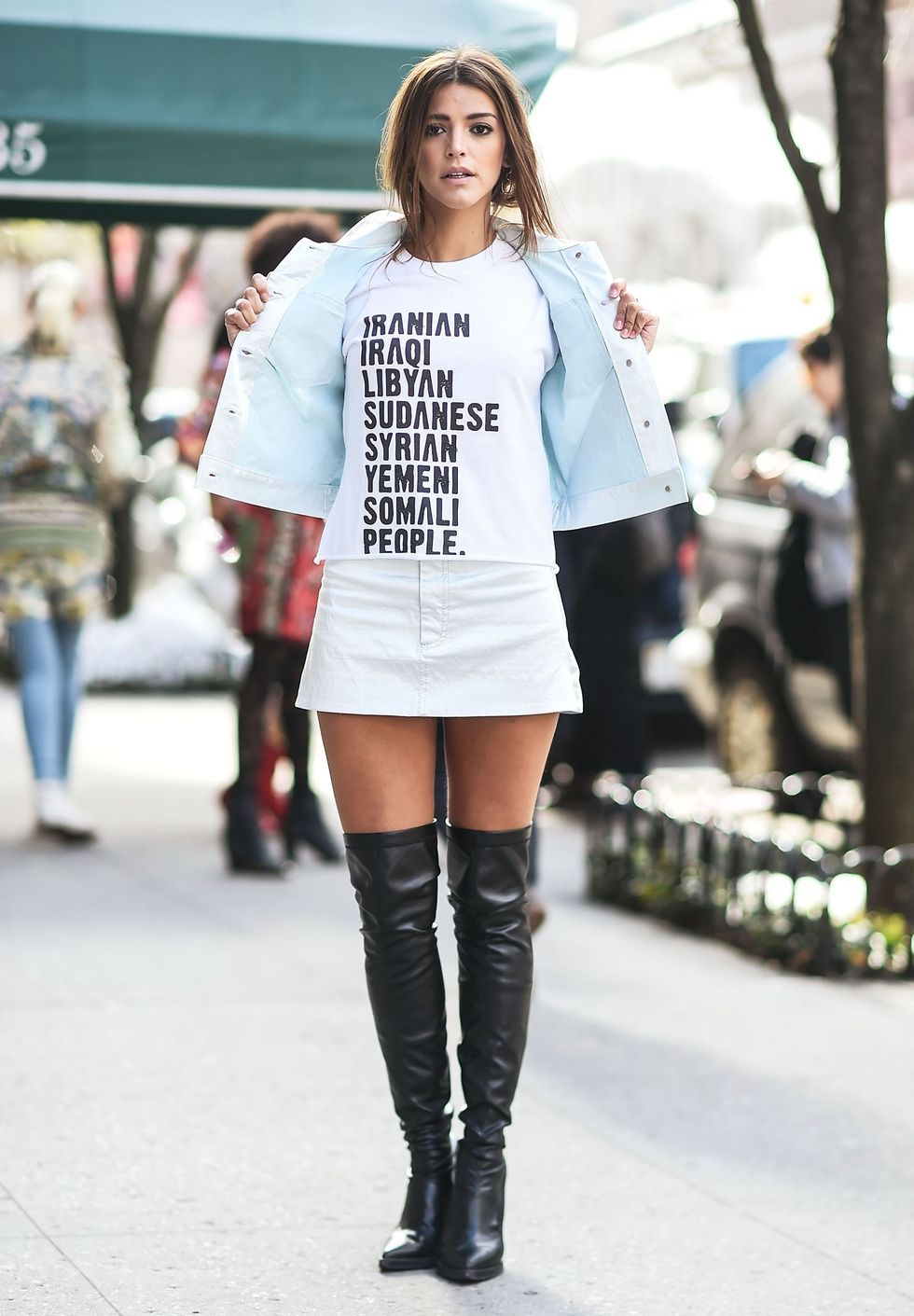 NEW YORK, NY - FEBRUARY 16:  Calu Rivero is seen wearing a We The People t-shirt, Marc Jacobs jacket and skirt and Stella McCartney boots during New York Fashion Week: Women's Fall/Winter 2017 on February 16, 2017 in New York City.  (Photo by Daniel Zuchnik/Getty Images)