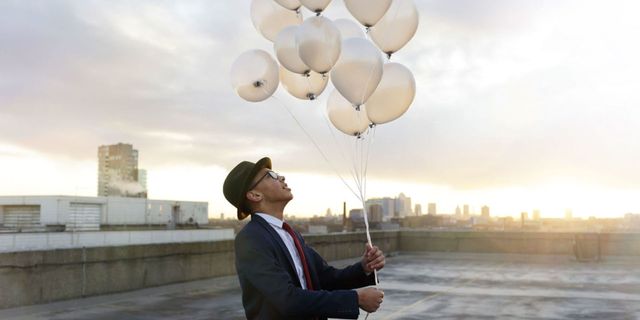 Balloon, Lighting, Sky, Suit, Architecture, Photography, Stock photography, Sitting, Cloud, Formal wear, 