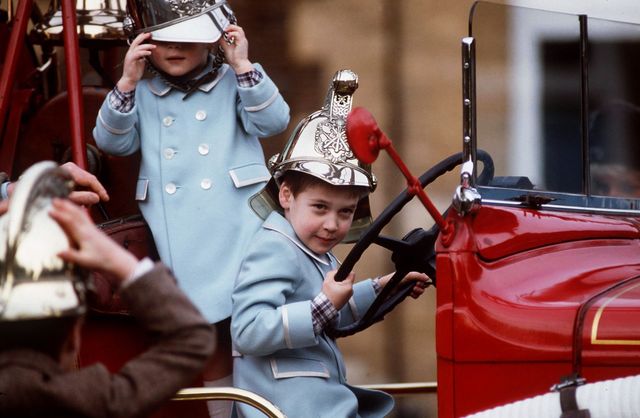 Prince William, Prince Harry play On A Fire Engine At Sandringham in 1988