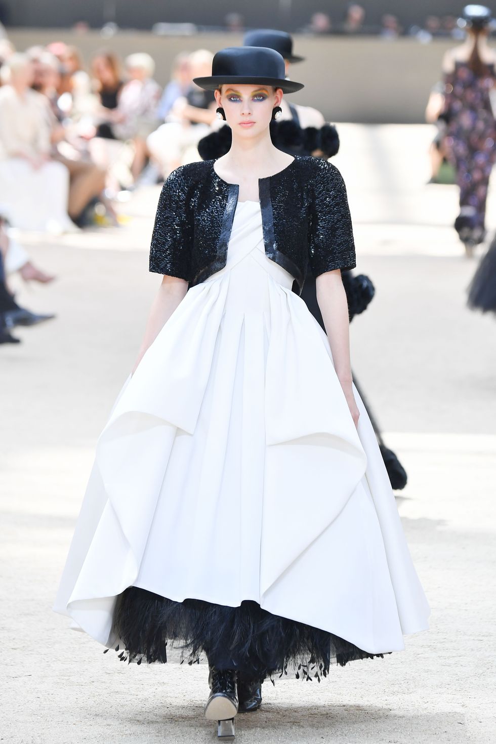 PARIS, FRANCE - JULY 04:  A model walks the runway during the Chanel Haute Couture Fall/Winter 2017-2018 show as part of Haute Couture Paris Fashion Week on July 4, 2017 in Paris, France.  (Photo by Stephane Cardinale - Corbis/Corbis via Getty Images)