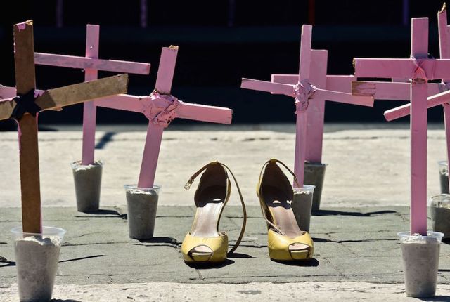 Cross, Pink, Religious item, Footwear, Line, Symbol, Shoe, Photography, Wood, Plant, 
