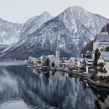 Nature, Reflection, Mountain, Natural landscape, Mountainous landforms, Water, Town, Mountain range, Winter, Lake, 