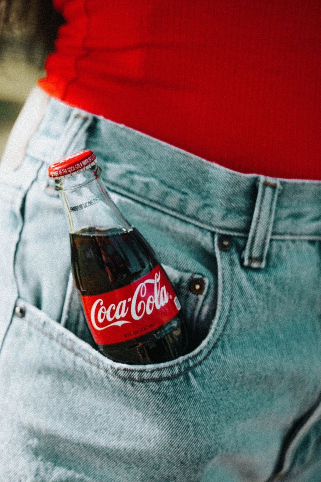 Coca-cola, Drink, Cola, Red, Jeans, Carbonated soft drinks, Soft drink, Coca, Bottle, Shorts, 