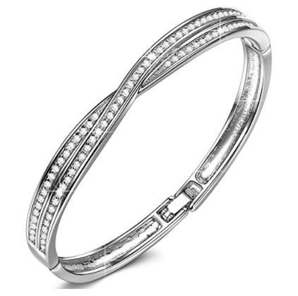 Platinum, Body jewelry, Jewellery, Fashion accessory, Metal, Bangle, Wedding ceremony supply, Wedding ring, Silver, Pre-engagement ring, 