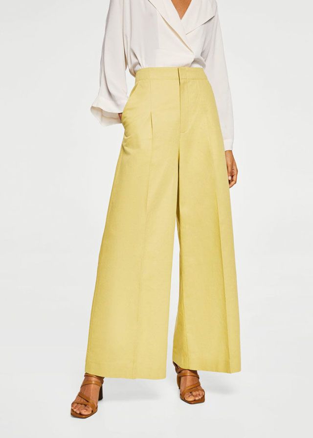 Clothing, Yellow, Trousers, Waist, Leg, Neck, Joint, Outerwear, Beige, Sleeve, 