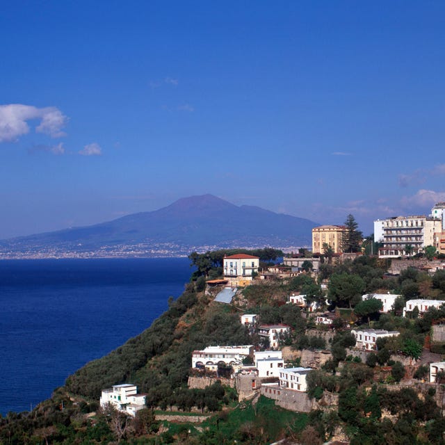 Coastal and oceanic landforms, Mountainous landforms, Coast, Hill, Neighbourhood, Residential area, Promontory, House, Azure, Sea, 