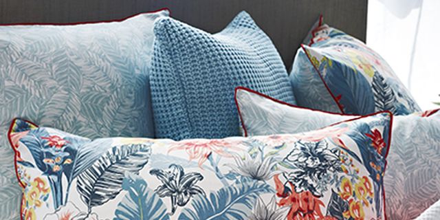 Blue, Orange, Textile, Cushion, Pattern, Throw pillow, Linens, Pillow, Bedding, Home accessories, 