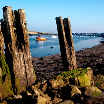 Coastal and oceanic landforms, Rock, Water, Coast, Watercraft, Boats and boating--Equipment and supplies, Sea, Shore, Azure, Ocean, 