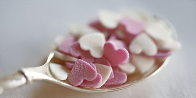Pink, Petal, Sweetness, Hair accessory, Heart, Artificial flower, Natural material, Sugar paste, Confectionery, 