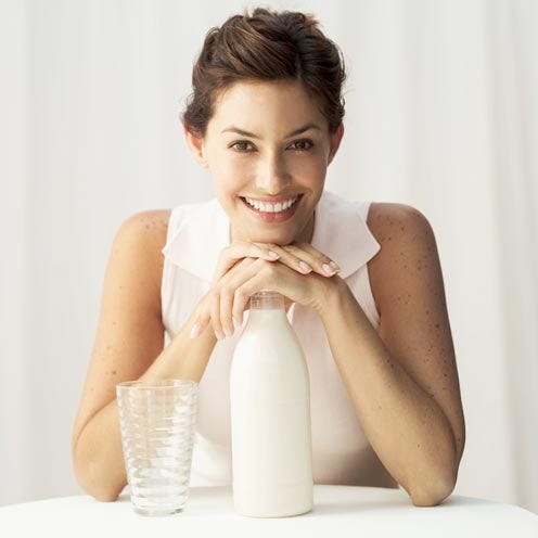 Finger, Hand, Elbow, Bottle, Tooth, Drinkware, Eyelash, Milk, Plastic bottle, Brown hair, 