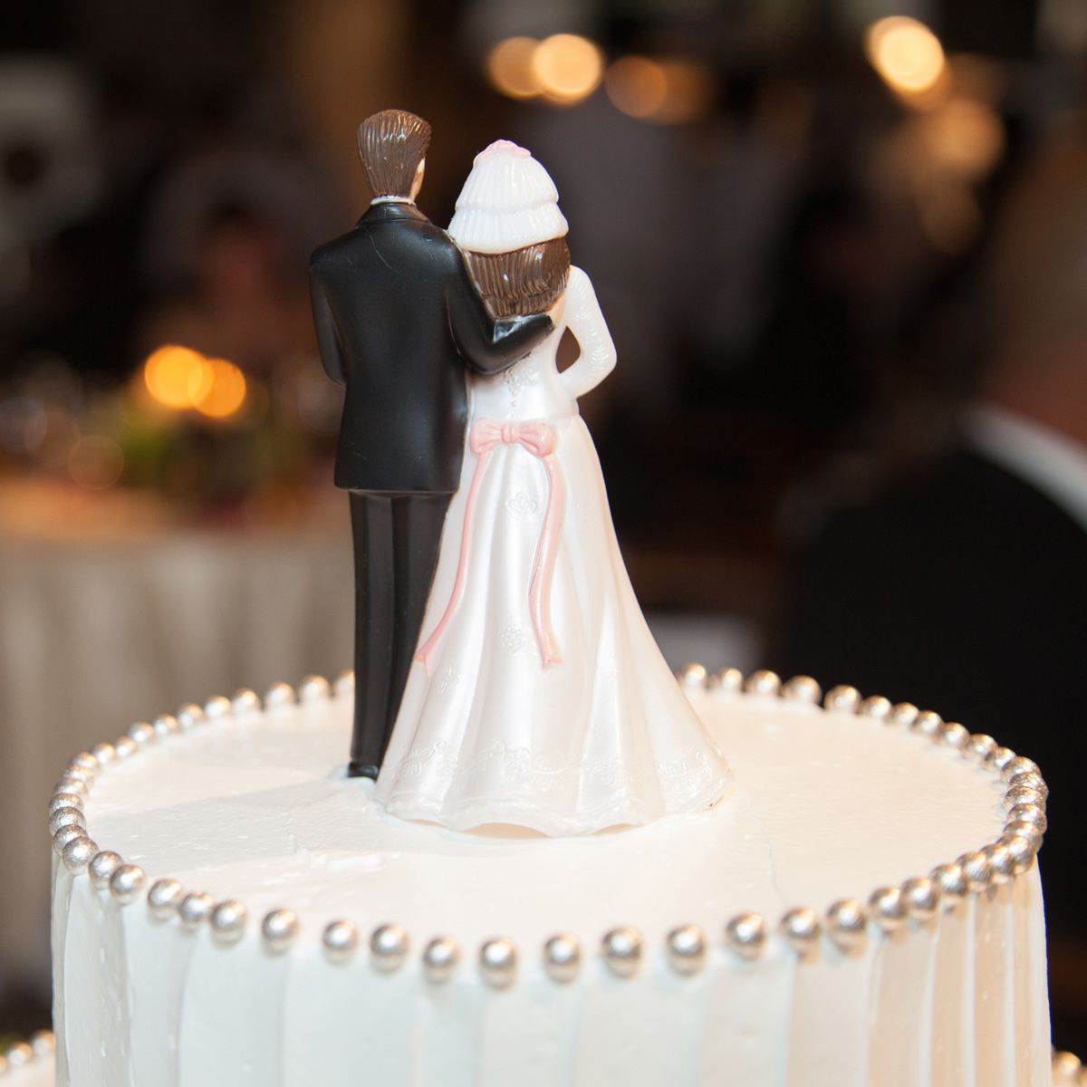 Cake, Dessert, Bridal clothing, Baked goods, Cake decorating, Formal wear, Bride, Dress, Wedding dress, Suit, 