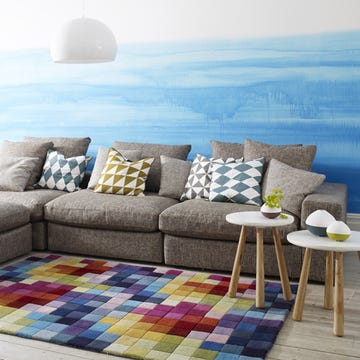Blue, Interior design, Furniture, Room, Living room, White, Couch, Wall, Home, Throw pillow, 