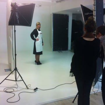 Shoulder, Floor, Standing, Flooring, Formal wear, Dress, Microphone stand, Film studio, Wood flooring, Snapshot, 