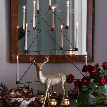 Deer, Reindeer, Interior design, Antler, Elk, Christmas, Candle holder, Fawn, Natural material, Still life photography, 