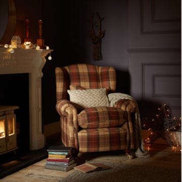 Wood, Room, Textile, Interior design, Floor, Flooring, Hearth, Chair, Home, Pillow, 