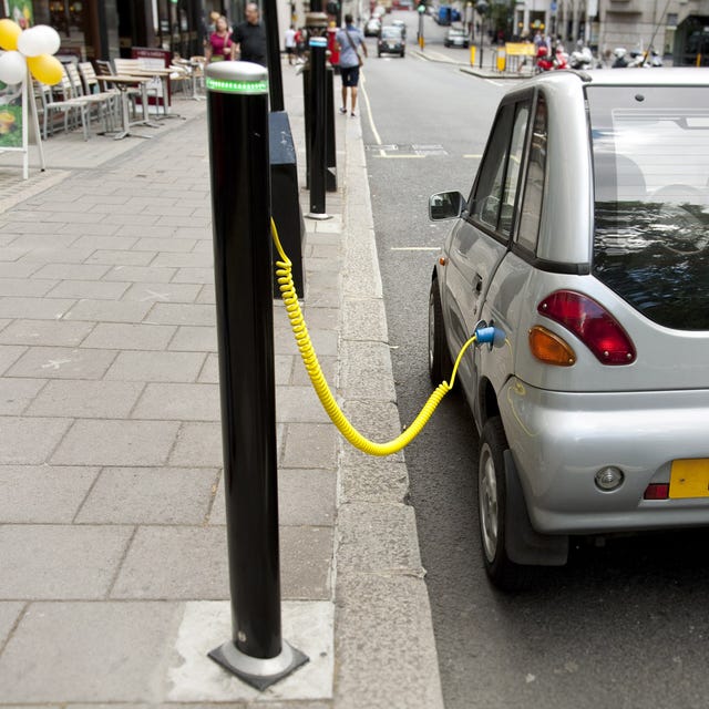 Motor vehicle, Yellow, Infrastructure, Road, Automotive parking light, Street, Car, Public space, Fender, City, 