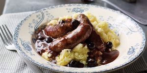 Venison sausages and mash with blueberry gravy