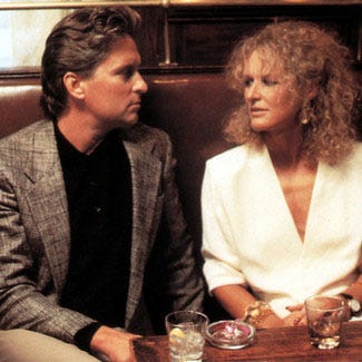 Hair, Mouth, Serveware, Drink, Tableware, Sitting, Drinkware, Jheri curl, Blazer, Conversation, 