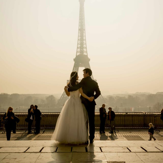 Tower, Trousers, Dress, Photograph, Bridal clothing, Coat, Suit, Tourism, Formal wear, Bride, 