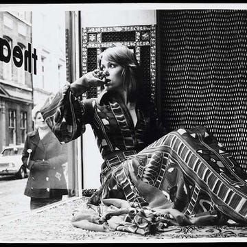Style, Monochrome, Street fashion, Street, Music artist, Monochrome photography, Black-and-white, Snapshot, Folk instrument, Boot, 