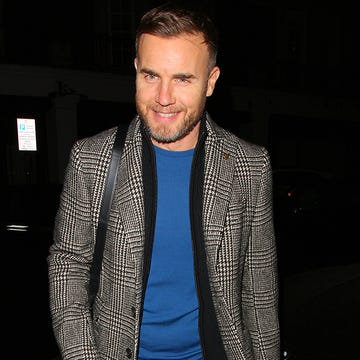 Facial hair, Standing, Collar, Beard, Jaw, Street fashion, Blazer, Jacket, Flash photography, Pleased, 