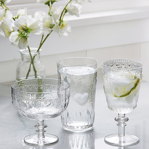 Drinkware, Glass, Serveware, Barware, Stemware, Dishware, Petal, Tableware, Transparent material, Artifact, 