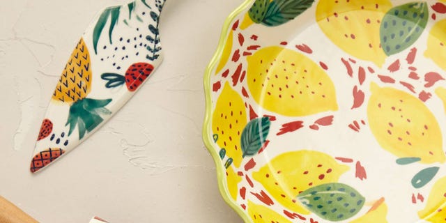 Yellow, Pattern, Art, Dishware, Creative arts, Kitchen utensil, Visual arts, Craft, Ceramic, Platter, 