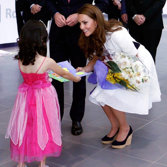 Clothing, Trousers, Event, Shoe, Outerwear, Bouquet, Coat, Pink, Formal wear, Dress, 