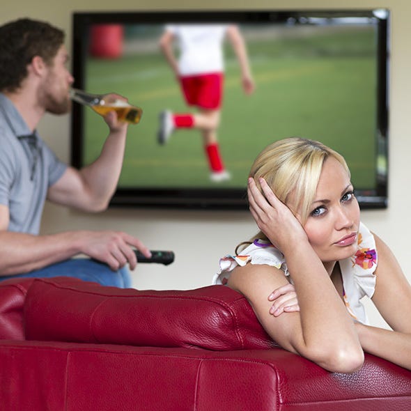 Arm, Hand, Mammal, Wrist, Couch, Elbow, Display device, Sitting, Television set, Flat panel display, 