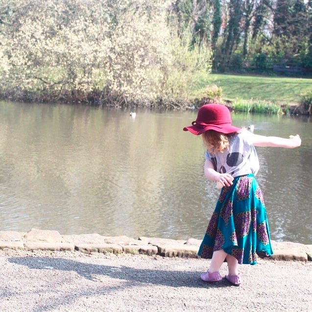 Clothing, Hat, Human body, Water resources, Bank, Dress, Headgear, Sun hat, Baby & toddler clothing, Spring, 