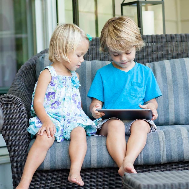 Leg, Human body, Sitting, Comfort, Human leg, Electronic device, Couch, Child, Lap, Thigh, 