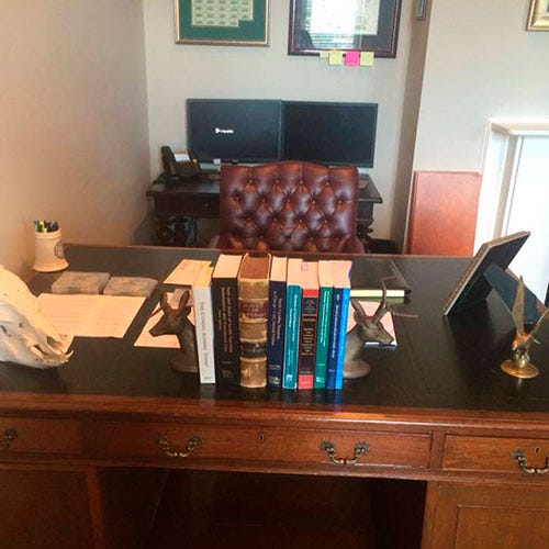 Room, Wood, Furniture, Interior design, Table, Picture frame, Drawer, Interior design, Cabinetry, Lamp, 