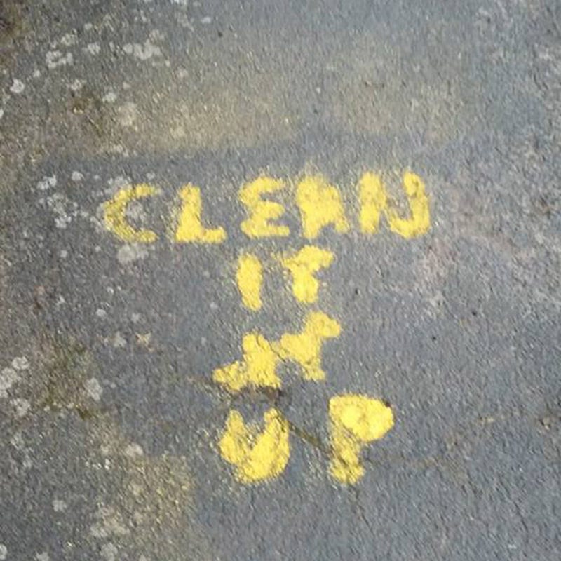 Yellow, Road surface, Asphalt, Text, Grey, Tar, Concrete, Symbol, Building material, Handwriting, 