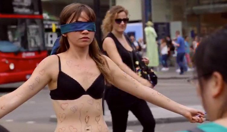 Why this girl undressed in public for a very courageous reason