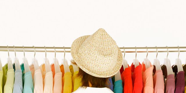 Textile, Clothes hanger, Retail, Back, Fashion design, Boutique, Fedora, Feather, Dry cleaning, Sun hat, 