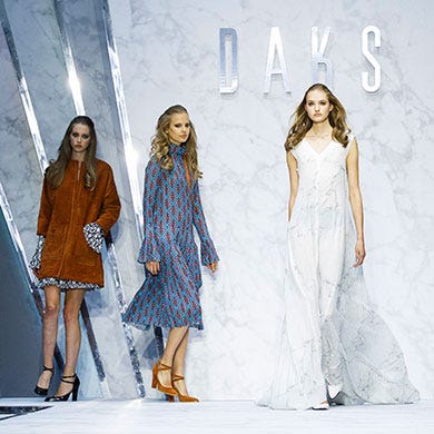 Clothing, Sleeve, Dress, Textile, Standing, Formal wear, One-piece garment, Style, Pattern, Fashion model, 