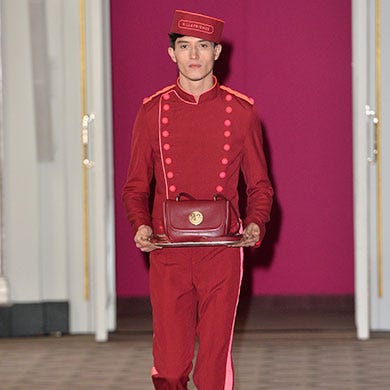 Sleeve, Collar, Headgear, Costume accessory, Uniform, Fashion, Costume, Costume hat, Belt, Door, 