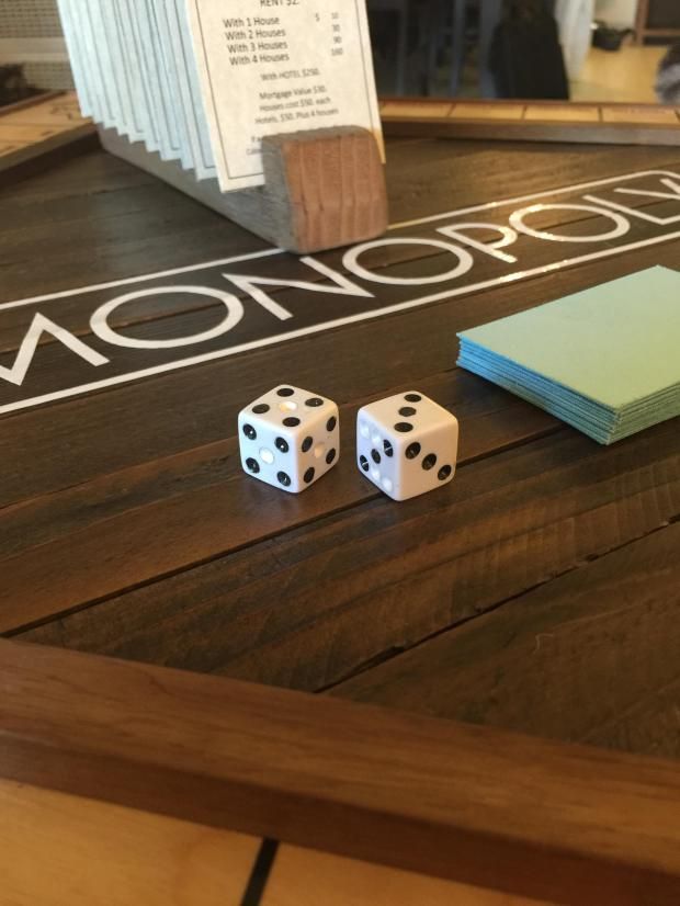 Wood, Indoor games and sports, Dice, Hardwood, Dice game, Wood stain, Flooring, Tabletop game, Pattern, Games, 
