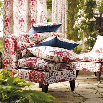 Textile, Cushion, Throw pillow, Maroon, Couch, Outdoor furniture, Velvet, Pillow, Armrest, Living room, 