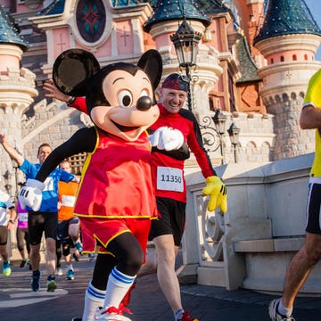 Footwear, Leg, Human leg, Shoe, Mascot, Walt disney world, Shorts, Athletic shoe, Physical fitness, World, 