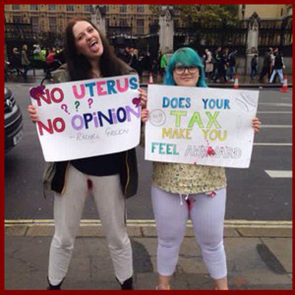 Women protest tampon tax by free-bleeding outside parliament