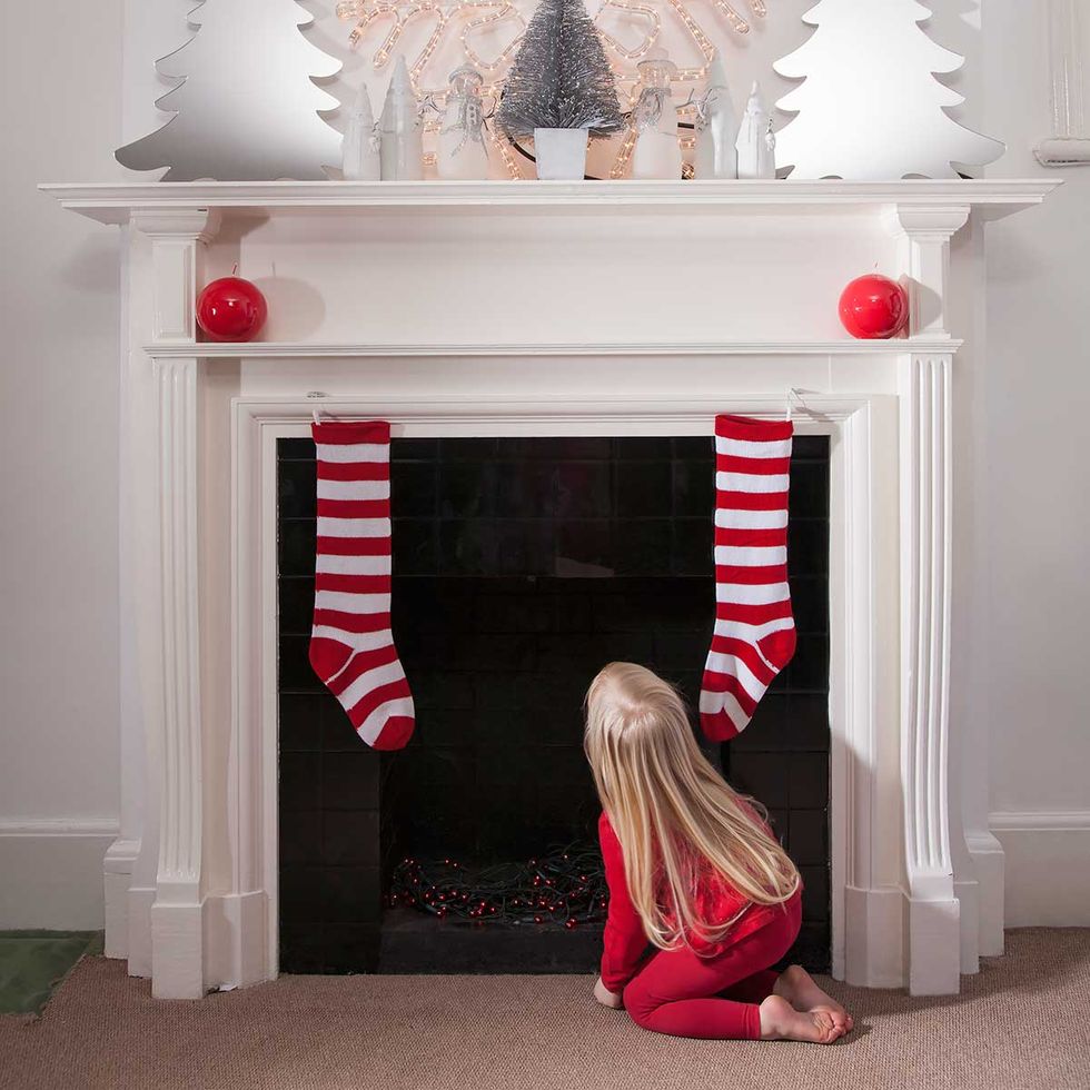 Red, Room, Interior design, White, Floor, Flooring, Interior design, Cone, Long hair, Christmas decoration, 