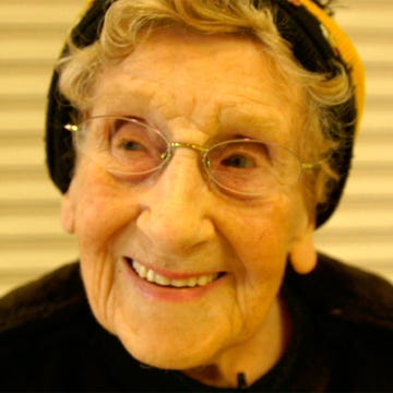 Eyewear, Vision care, Cheek, Smile, Audio equipment, Chin, Forehead, Eyebrow, Happy, Facial expression, 